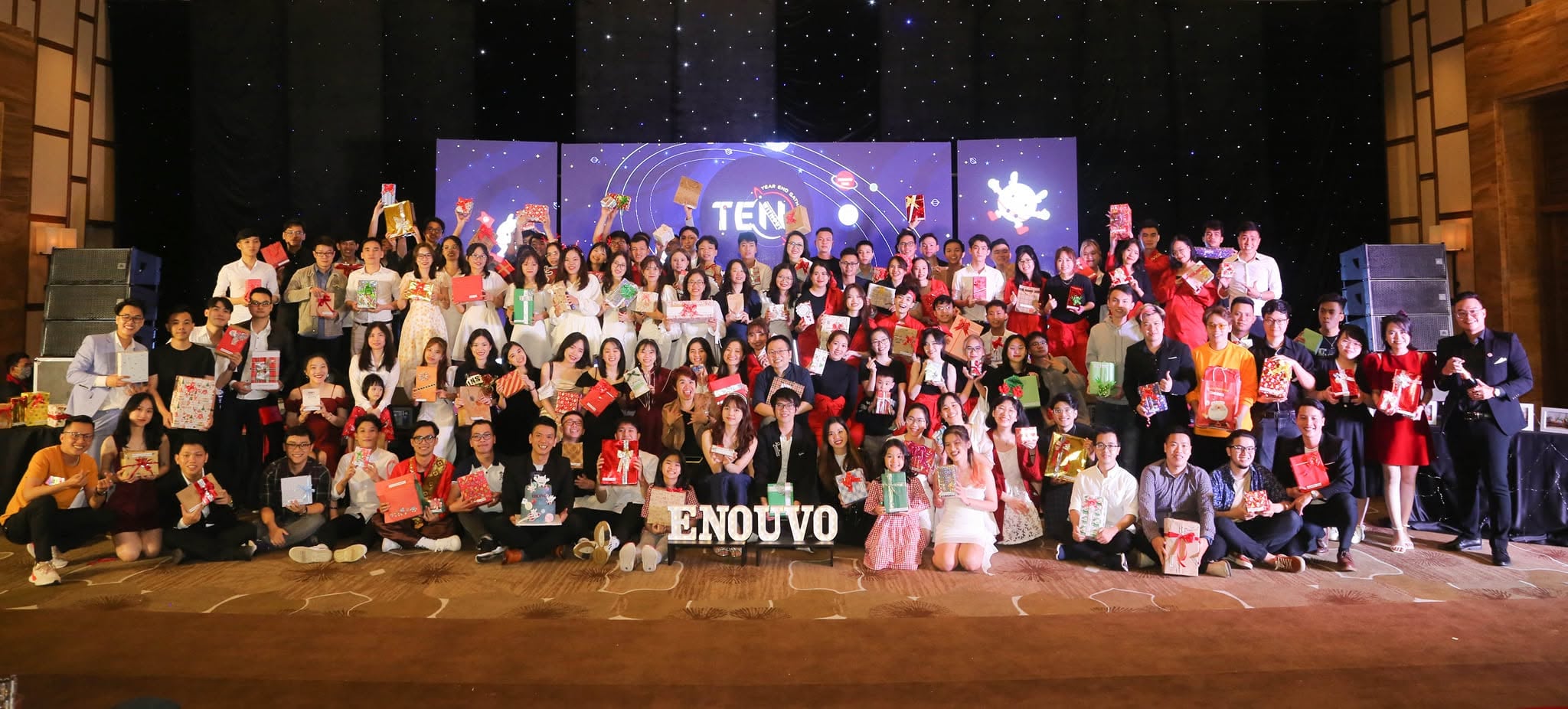 A panoramic Enouvo team portrait at a year-end celebration