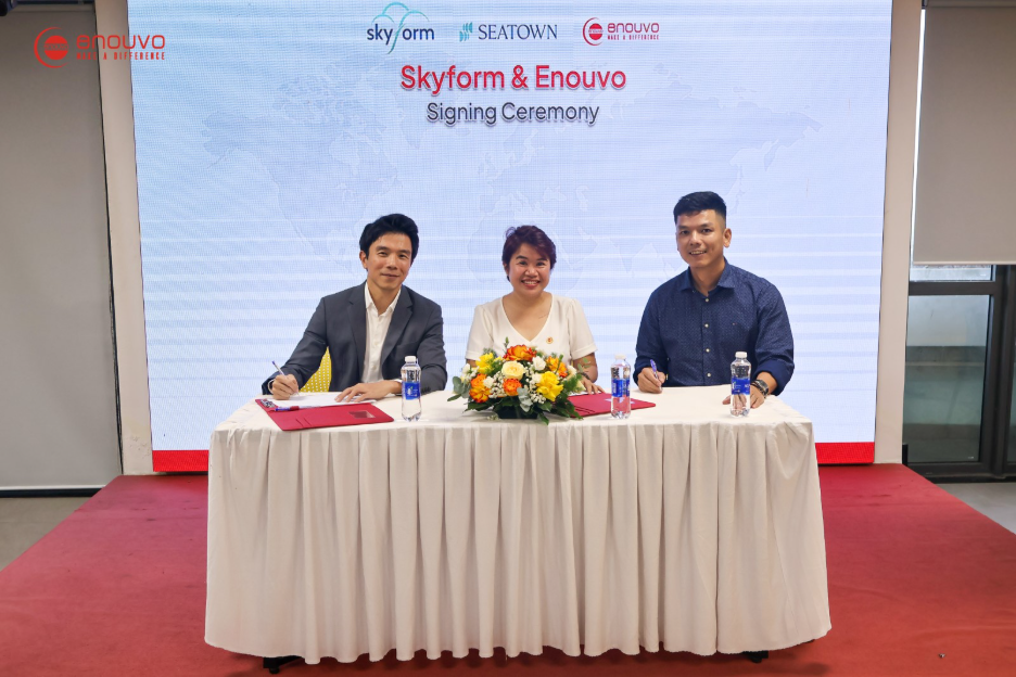 Yuan En Lim, Founder and CEO of Skyform; Trang Tran, Founder and CEO of Enouvo; and Nguyen Pham, Co-founder and Senior Advisor of Enouvo, standing together.